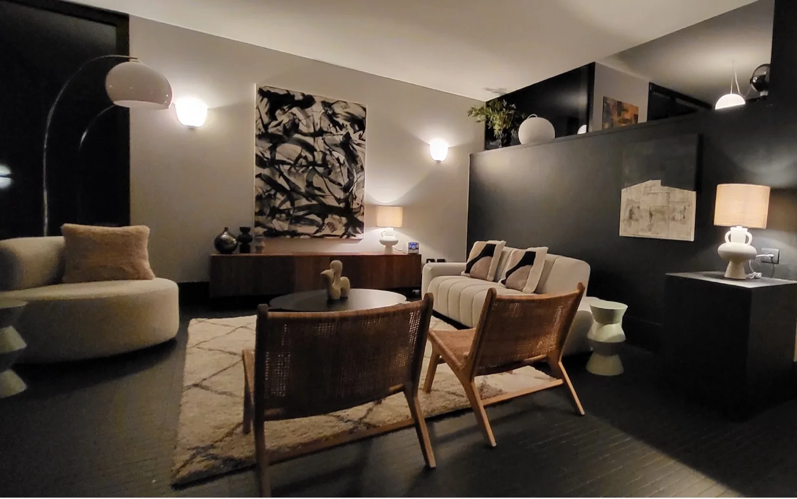 Living room in the evening with sideboard and art