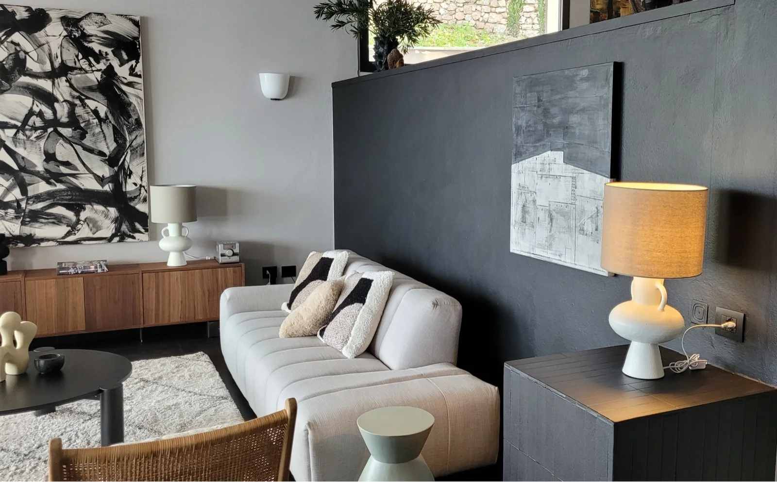 Living room with natural light and seating area